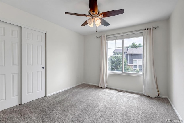 2430 S Jebel Way, Aurora, CO 80013 - unfurnished bedroom featuring carpet floors, a closet, and a ceiling fan