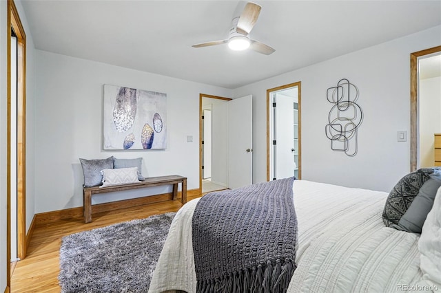 3053 Mcintosh Dr, Longmont, CO 80503 - bedroom with light wood finished floors and ceiling fan