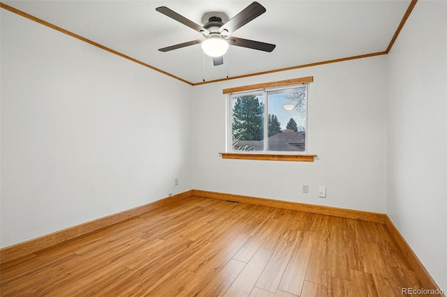 3053 Mcintosh Dr, Longmont, CO 80503 - empty room with ornamental molding, a ceiling fan, and wood finished floors