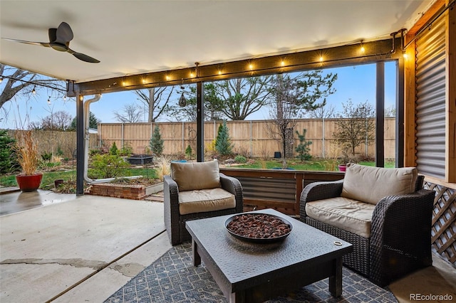 3053 Mcintosh Dr, Longmont, CO 80503 - fenced backyard with a patio and ceiling fan