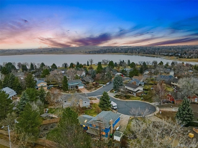 3053 Mcintosh Dr, Longmont, CO 80503 - aerial view at dusk of a water view and a residential view