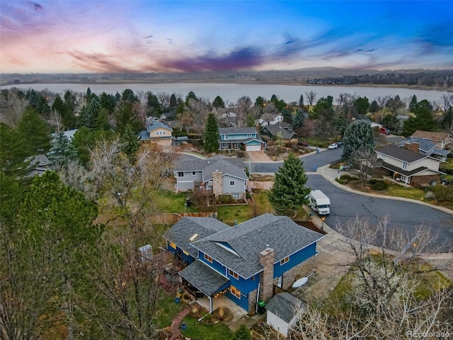 3053 Mcintosh Dr, Longmont, CO 80503 - aerial view at dusk of a water view and a residential view