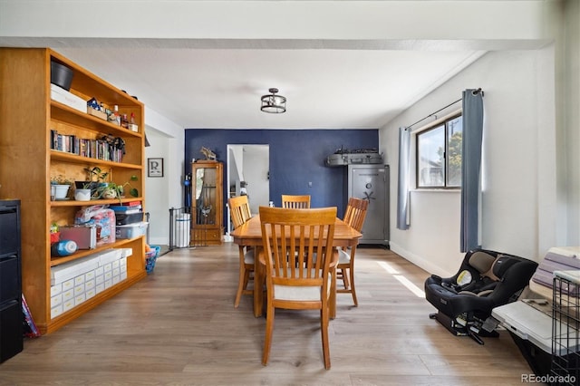 330 2nd St, Kersey, CO 80644 - dining room featuring wood finished floors and baseboards