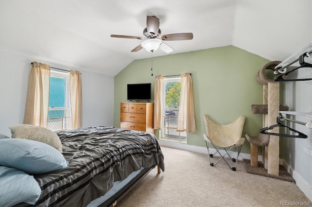 330 2nd St, Kersey, CO 80644 - carpeted bedroom with lofted ceiling, baseboards, and a ceiling fan