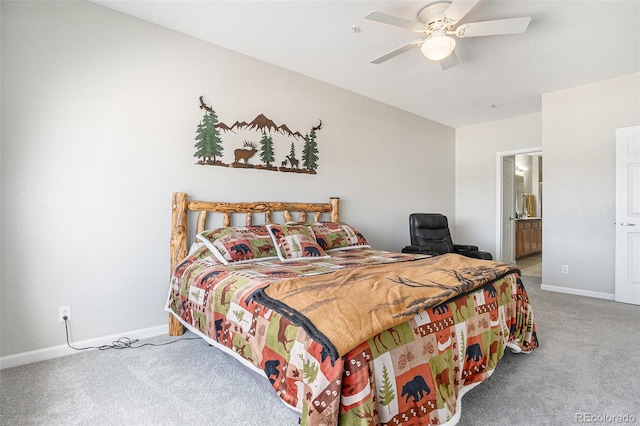 carpeted bedroom featuring a ceiling fan, connected bathroom, and baseboards