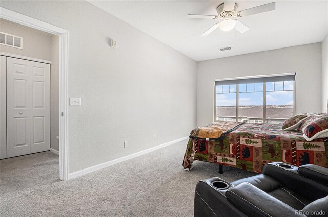 bedroom with a ceiling fan, carpet, visible vents, and baseboards