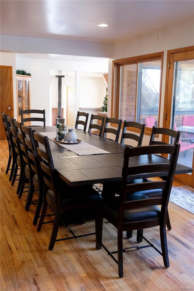 dining area featuring light wood-style floors