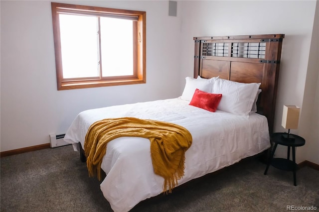 bedroom with a baseboard radiator, baseboards, and carpet floors