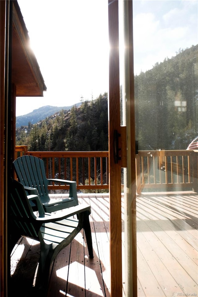 deck with a forest view