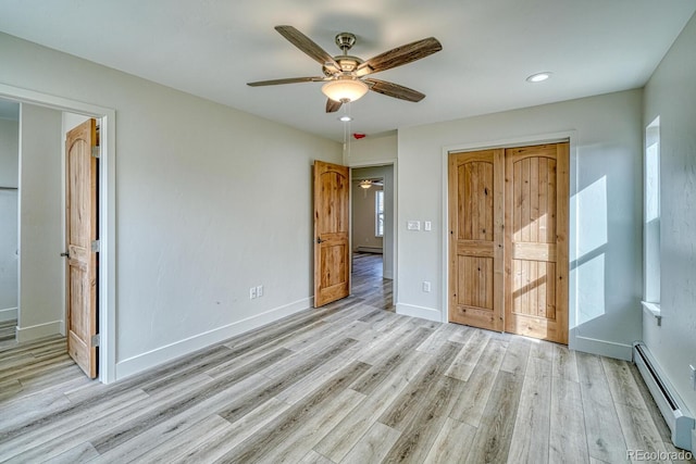 880 Hoover Cir, Poncha Springs, CO 81242 - unfurnished bedroom with baseboard heating, light wood-type flooring, baseboards, ceiling fan, and recessed lighting