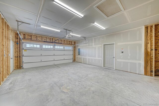 880 Hoover Cir, Poncha Springs, CO 81242 - garage featuring electric panel and a garage door opener