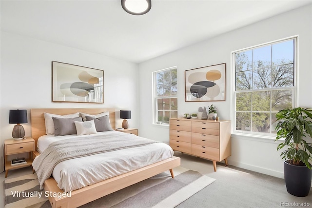 6722 S Independence St, Littleton, CO 80128 - bedroom with baseboards and light colored carpet