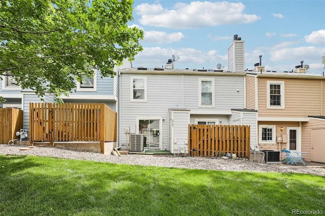 6722 S Independence St, Littleton, CO 80128 - back of property with central air condition unit