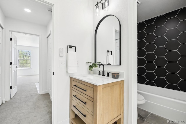 6722 S Independence St, Littleton, CO 80128 - bathroom featuring vanity, tub / shower combination, and toilet