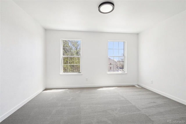 6722 S Independence St, Littleton, CO 80128 - empty room featuring carpet flooring and baseboards