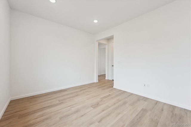 24780 E 39th Ave, Aurora, CO 80019 - empty room with light wood-style flooring, baseboards, and recessed lighting