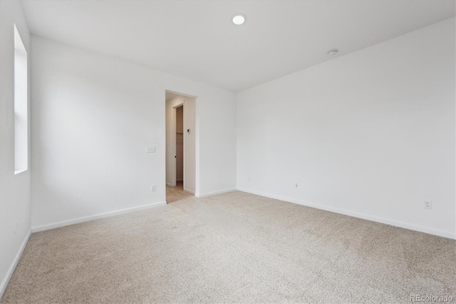 24780 E 39th Ave, Aurora, CO 80019 - unfurnished room featuring light carpet and baseboards