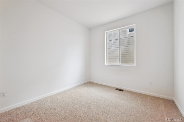24780 E 39th Ave, Aurora, CO 80019 - unfurnished room with light carpet and baseboards