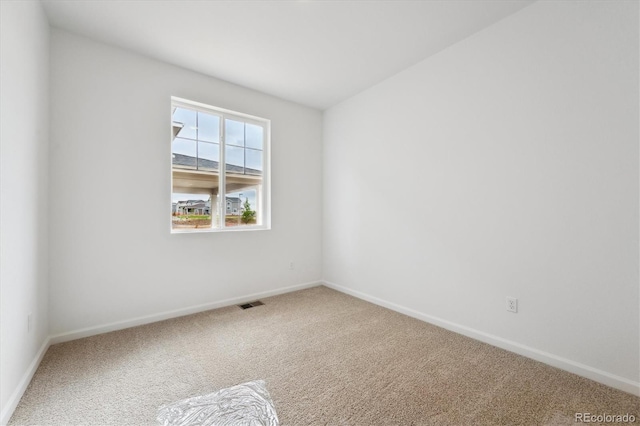 24780 E 39th Ave, Aurora, CO 80019 - spare room with carpet floors and baseboards
