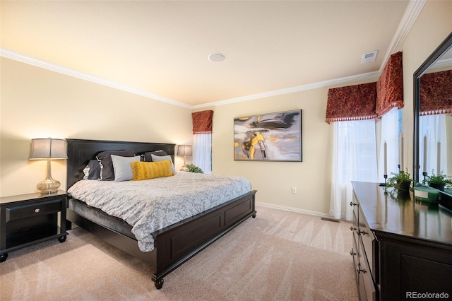 bedroom with baseboards, visible vents, light carpet, and ornamental molding