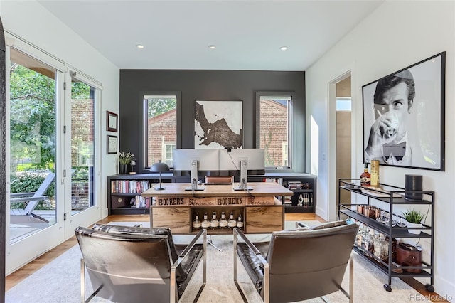 living area with light hardwood / wood-style flooring