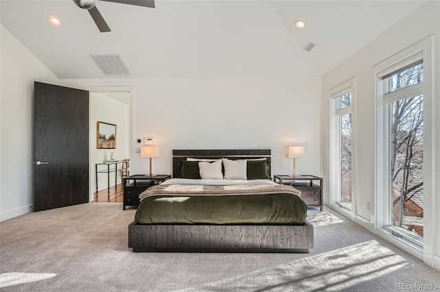 carpeted bedroom with ceiling fan, lofted ceiling, and access to outside