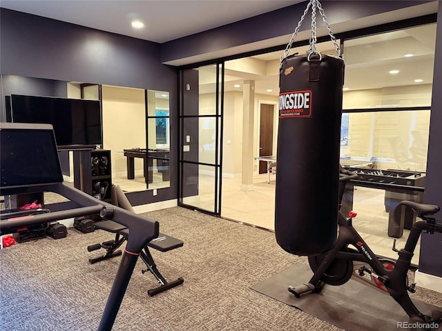 workout area with light colored carpet