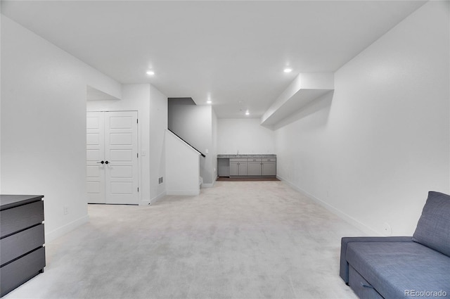 bonus room with light colored carpet