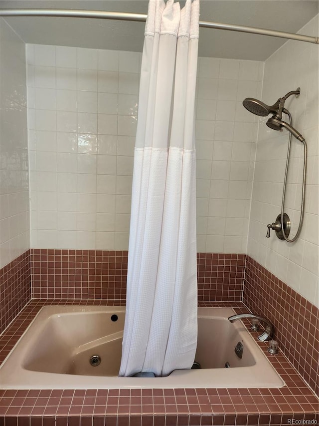 bathroom with shower / bath combination with curtain