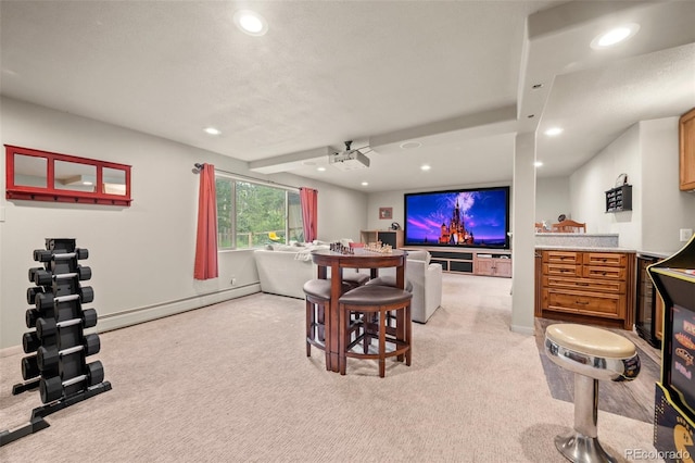 29663 Paint Brush Dr, Evergreen, CO 80439 - living room featuring recessed lighting, light colored carpet, a baseboard radiator, baseboards, and wine cooler