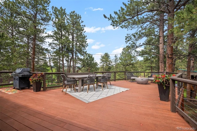 29663 Paint Brush Dr, Evergreen, CO 80439 - deck with grilling area and outdoor dining space