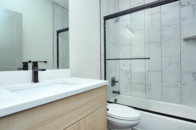 6450 Cleora Rd Unit C, Salida, CO 81201 - bathroom with toilet, vanity, and shower / bath combination with glass door