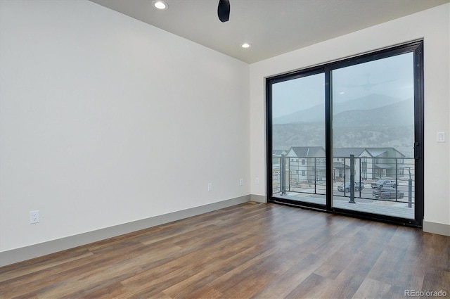 6450 Cleora Rd Unit C, Salida, CO 81201 - spare room with wood finished floors, recessed lighting, baseboards, and a ceiling fan