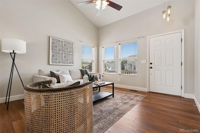 9579 Bighorn Way, Littleton, CO 80125 - living room featuring ceiling fan, high vaulted ceiling, and dark wood finished floors