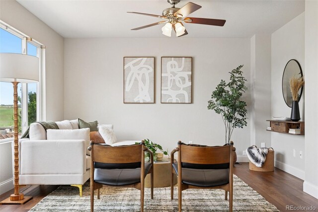 9579 Bighorn Way, Littleton, CO 80125 - sitting room featuring wood finished floors and ceiling fan