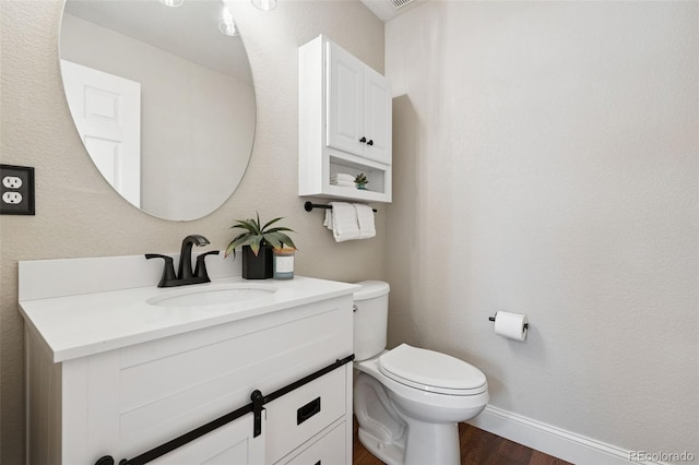 9579 Bighorn Way, Littleton, CO 80125 - bathroom with vanity and wood finished floors