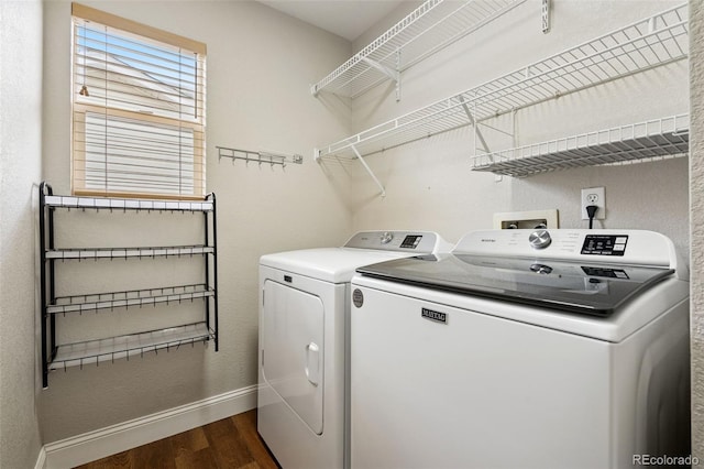 9579 Bighorn Way, Littleton, CO 80125 - laundry area featuring independent washer and dryer and dark wood-style floors