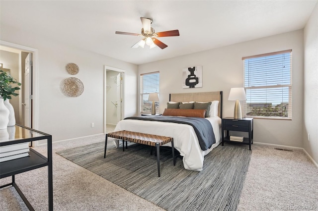 9579 Bighorn Way, Littleton, CO 80125 - carpeted bedroom featuring baseboards and ceiling fan