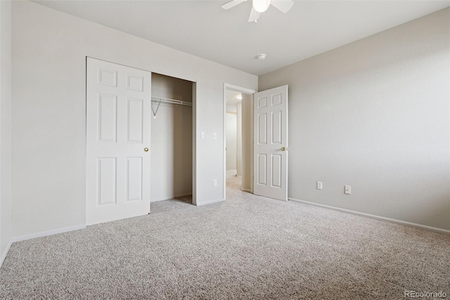 9579 Bighorn Way, Littleton, CO 80125 - unfurnished bedroom featuring carpet floors, a closet, and a ceiling fan