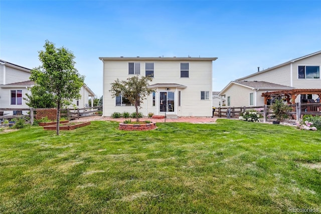 9579 Bighorn Way, Littleton, CO 80125 - rear view of house featuring a garden, a fenced backyard, and a patio area
