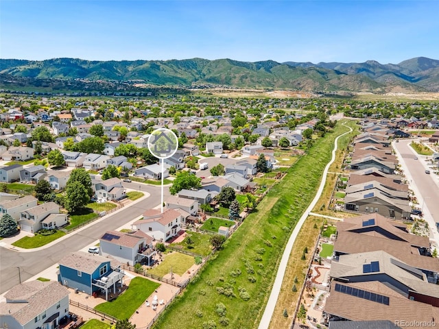 9579 Bighorn Way, Littleton, CO 80125 - aerial perspective of suburban area with mountains