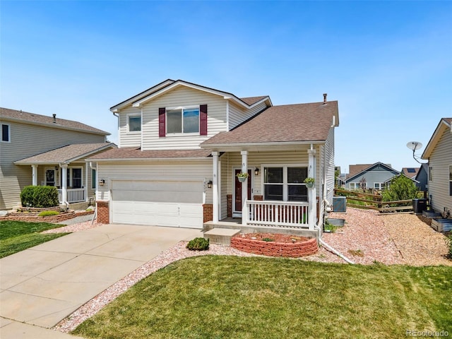 9579 Bighorn Way, Littleton, CO 80125 - traditional home featuring a porch, driveway, a front lawn, an attached garage, and brick siding