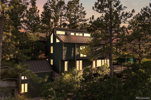 6207 Elbert Pl, Parker, CO 80134 - back of house featuring a standing seam roof and a metal roof