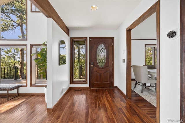 6207 Elbert Pl, Parker, CO 80134 - entryway with dark wood finished floors and recessed lighting