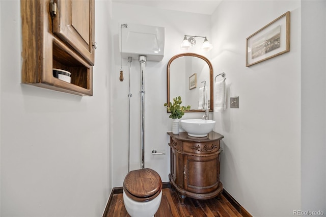 6207 Elbert Pl, Parker, CO 80134 - bathroom featuring wood finished floors and vanity