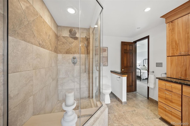 6207 Elbert Pl, Parker, CO 80134 - full bathroom featuring a shower stall, recessed lighting, and vanity