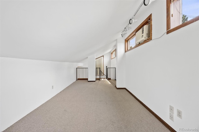 6207 Elbert Pl, Parker, CO 80134 - bonus room with light colored carpet, healthy amount of natural light, and a wall mounted air conditioner
