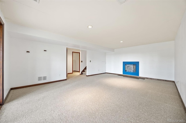6207 Elbert Pl, Parker, CO 80134 - carpeted spare room featuring stairs and recessed lighting