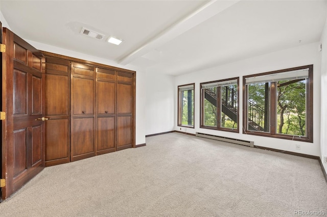 6207 Elbert Pl, Parker, CO 80134 - unfurnished bedroom featuring a baseboard radiator, carpet flooring, and beam ceiling