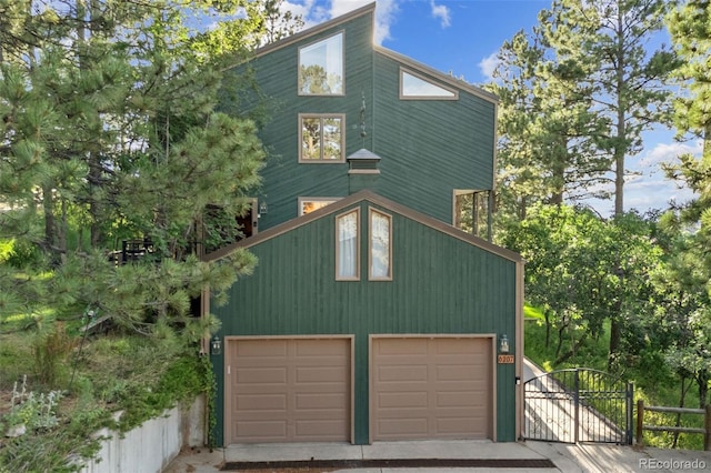 6207 Elbert Pl, Parker, CO 80134 - garage featuring a gate and a garage